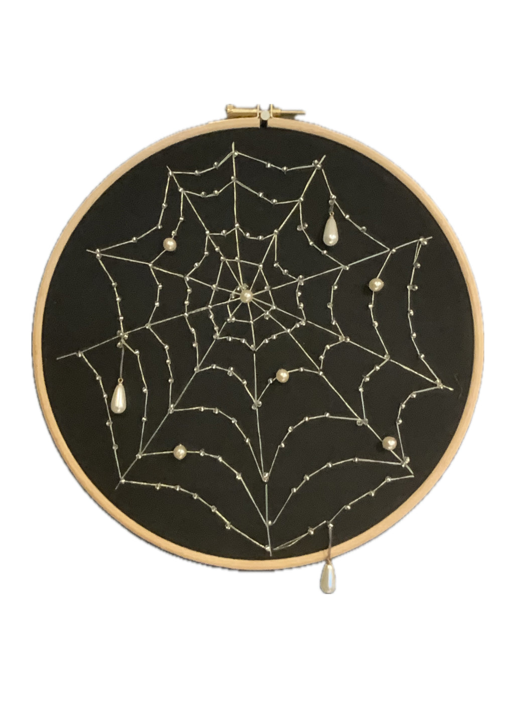 Embroidered cobweb